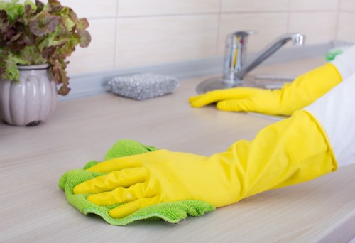 Technician performing sofa cleaning in Colyers for stain removal